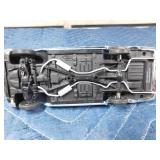 2 die cast cars and 1 tin car