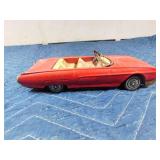 2 die cast cars and 1 tin car