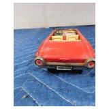 2 die cast cars and 1 tin car