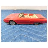 2 die cast cars and 1 tin car