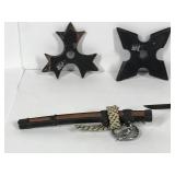 3 throwing knives and 1 small samurai sword