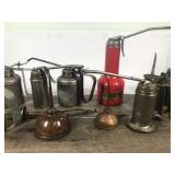 Lot of thumb press oil cans