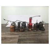 Lot of thumb press oil cans