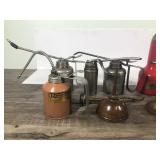 Lot of thumb press oil cans