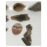 Lot of polished rocks with agates and a rock made into jewelry