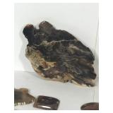 Lot of polished rocks with agates and a rock made into jewelry