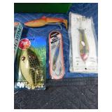 6 Muskey lures in a Remington case