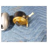 2 Vintage fishing reels with reel pouch