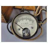 Vintage "Beede Electrical" DC Voltmeter with wood Case, Tin Champion Spark Plug Case, 110V Strobe Light (works) and More