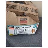 Boxes of Simpson StrongTie LUS2102 Hangers and PSCL 1/2 Sheathing Clips
