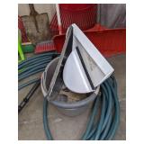 A Variety of Cleaning Tools Including Rakes, Garden Hose, Snow Shovel and More