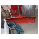 A Variety of Cleaning Tools Including Rakes, Garden Hose, Snow Shovel and More