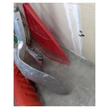 A Variety of Cleaning Tools Including Rakes, Garden Hose, Snow Shovel and More