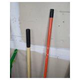 A Variety of Cleaning Tools Including Rakes, Garden Hose, Snow Shovel and More