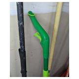 A Variety of Cleaning Tools Including Rakes, Garden Hose, Snow Shovel and More
