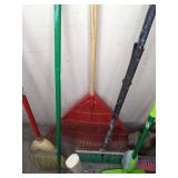 A Variety of Cleaning Tools Including Rakes, Garden Hose, Snow Shovel and More