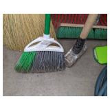 A Variety of Cleaning Tools Including Rakes, Garden Hose, Snow Shovel and More