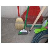 A Variety of Cleaning Tools Including Rakes, Garden Hose, Snow Shovel and More