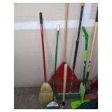 A Variety of Cleaning Tools Including Rakes, Garden Hose, Snow Shovel and More