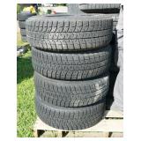 Set of 4 Bridgestone Blizzak 195/65R15 tires and rims