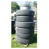 Stack of misc truck tires for recap or storage trailers