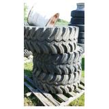 3 Ground Hawg 17/40-16.5 tires with rims
