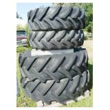 Two 14.9R24 tractor tires and Two 16.9R34