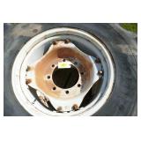 Two 14.9R24 tractor tires and Two 16.9R34