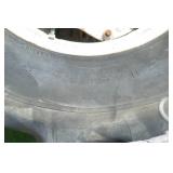 Two 14.9R24 tractor tires and Two 16.9R34