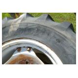 Two 14.9R24 tractor tires and Two 16.9R34