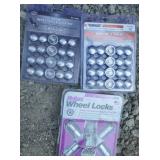 Two 20pc wheel nut and lock kits and one 4pc M14-1.50
