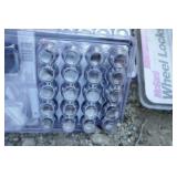 Two 20pc wheel nut and lock kits and one 4pc M14-1.50