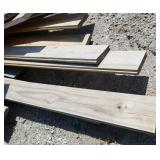 Pile of new lumber tongue in groove boards