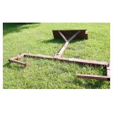 Skid loader wheel lift