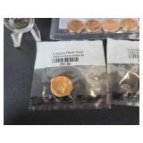 Lot of Uncirculated US Coins - 2009 Pennies, 1956, 1957, and 1970 Pennies, and 2010 Yellowstone National Park Quarter