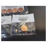 Lot of Uncirculated US Coins - 2009 Pennies, 1956, 1957, and 1970 Pennies, and 2010 Yellowstone National Park Quarter