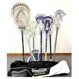 Various LaCrosse Goalie and Other Sticks with REEBOK LaCrosse Bag and Balls