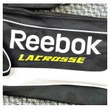 Various LaCrosse Goalie and Other Sticks with REEBOK LaCrosse Bag and Balls