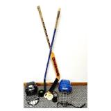 2 Hockey Sticks / 3 Packs of Hockey Tape and 2 BAUER Helmets