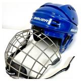 2 Hockey Sticks / 3 Packs of Hockey Tape and 2 BAUER Helmets