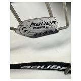 2 Hockey Sticks / 3 Packs of Hockey Tape and 2 BAUER Helmets