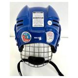 2 Hockey Sticks / 3 Packs of Hockey Tape and 2 BAUER Helmets