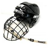 2 Hockey Sticks / 3 Packs of Hockey Tape and 2 BAUER Helmets