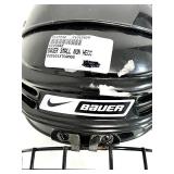 2 Hockey Sticks / 3 Packs of Hockey Tape and 2 BAUER Helmets