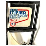 2 Hockey Sticks / 3 Packs of Hockey Tape and 2 BAUER Helmets