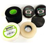 2 Hockey Sticks / 3 Packs of Hockey Tape and 2 BAUER Helmets