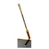 2 Hockey Sticks / 3 Packs of Hockey Tape and 2 BAUER Helmets