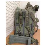 Military Backpack With Frame, Full Of Ponchos