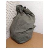 Military Duffel With Camo Shirts & Pants