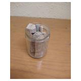 Jar Of Small Pieces Petrified Wood